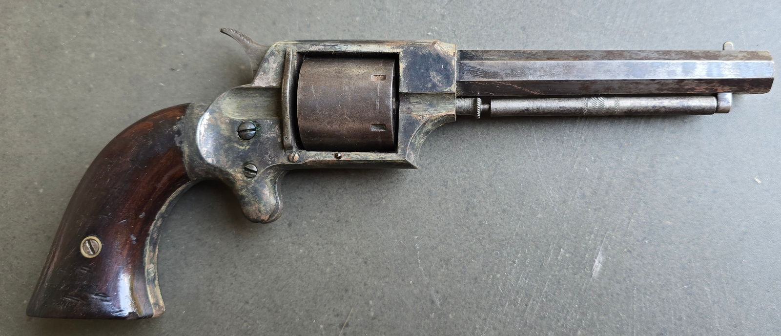 WL Grant Pocket Revolver by Uhlinger: Uhlinger produced these handy revolvers between 1861 and 1865. A great many are found marked with the names of other gun makers and gun dealers as this one is. It has a 4 inch octagonal 32 caliber bar