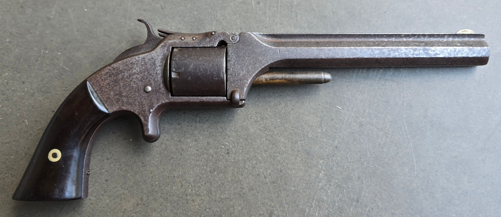 Civil War Smith & Wesson No 2 Army Revolver: The S&W No. 2 was a popular sidearm during the Civil War and used the fixed .32 caliber rimfire cartridge. 6-shot, tip-up barrel. Signed “SMITH & WESSON. SPRINGFIELD, MASS.” on the rib atop th