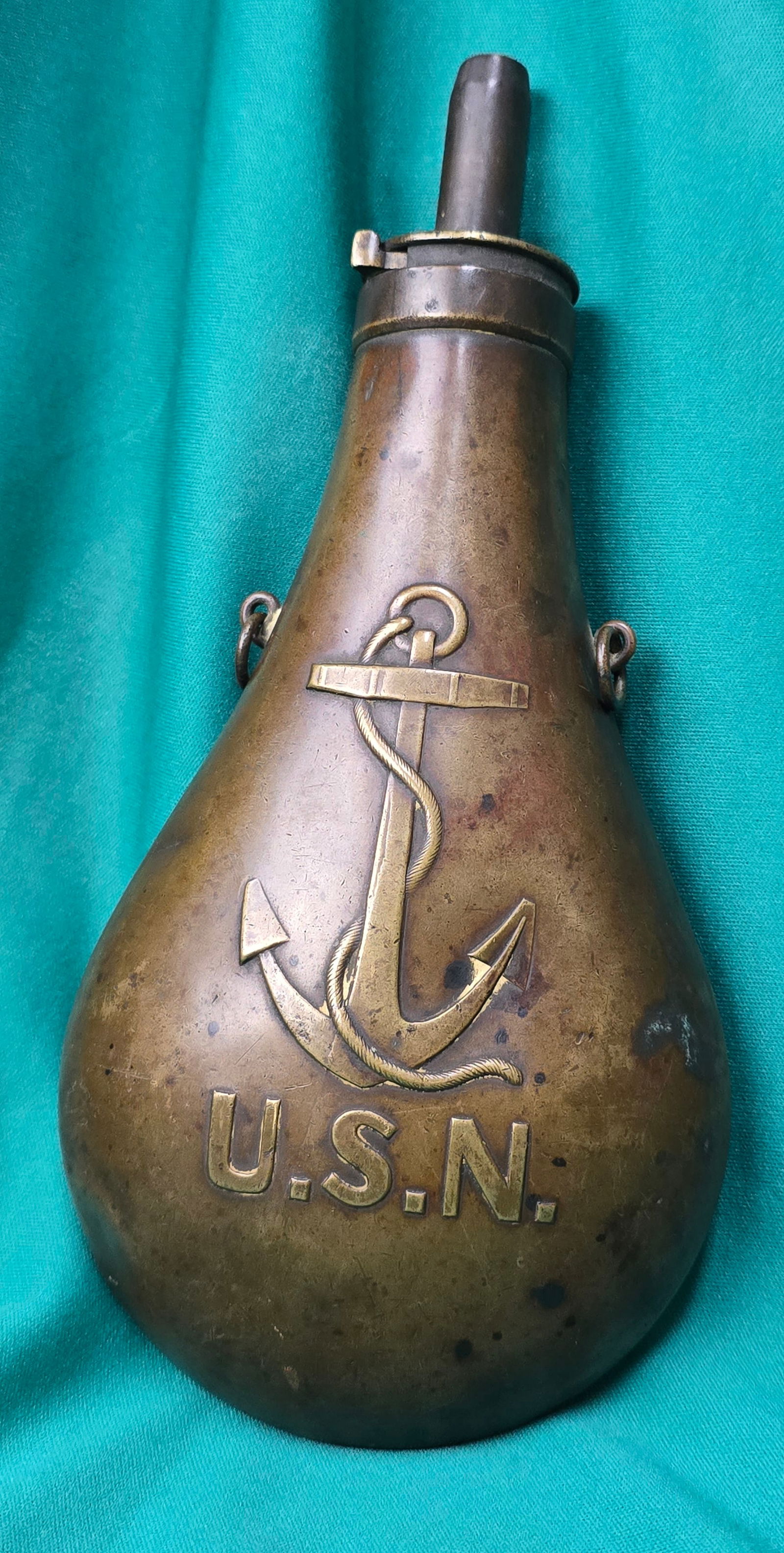 1843 USN Powder Flask: Antique US Navy "Fouled Anchor" Powder Flask, dating to the 1843 contract. U.S. Navy powder flask for use with the Jenks rifle, Ames 1842 boxlock pistol, and other naval firearms. The flask body has a