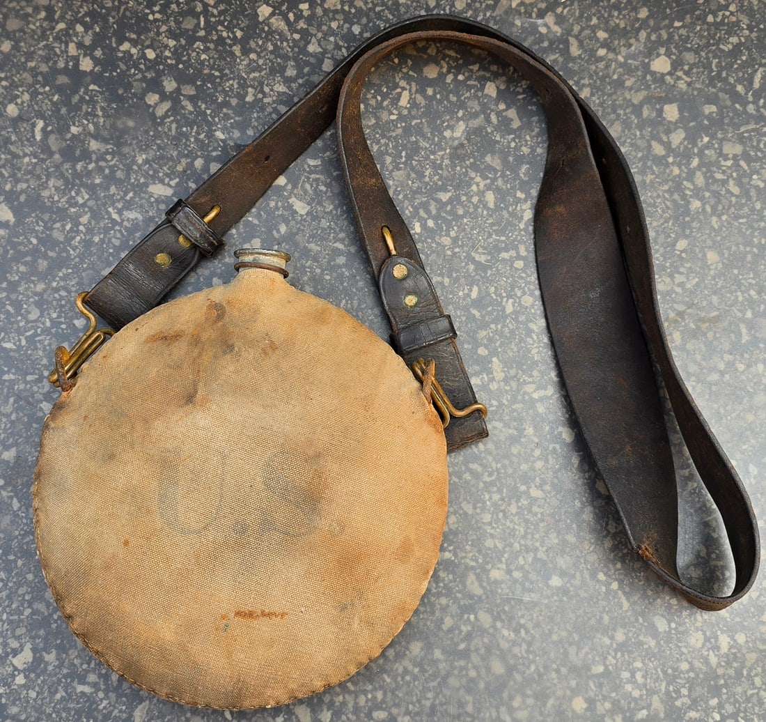 Spanish American War Canteen: Indian War / SAW canteen with the shoulder strap.. no stopper. A real nice solid example. $25 for packing, shipping, and signature service. Insurance is $2 per hundred dollars in value. No shipments o