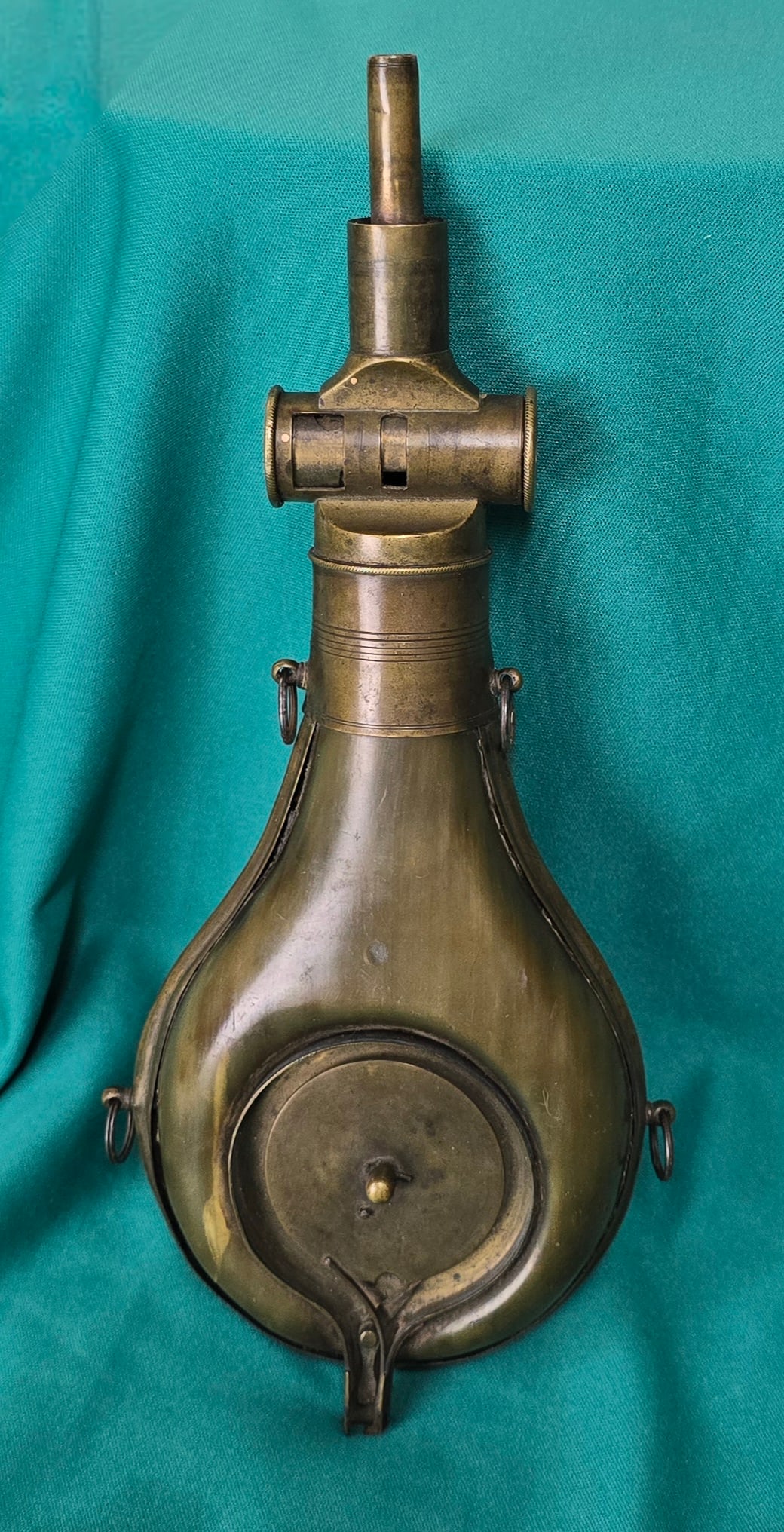 Very Rare Large Polished Horn Powder Flask w Integral Capper.: This is a heck of a piece of firearms history. Ca. 1850 large rifle or shotgun flask made of polished horn. Has brass charging hardware, furniture, and capper. The capper is inset into the flat body.