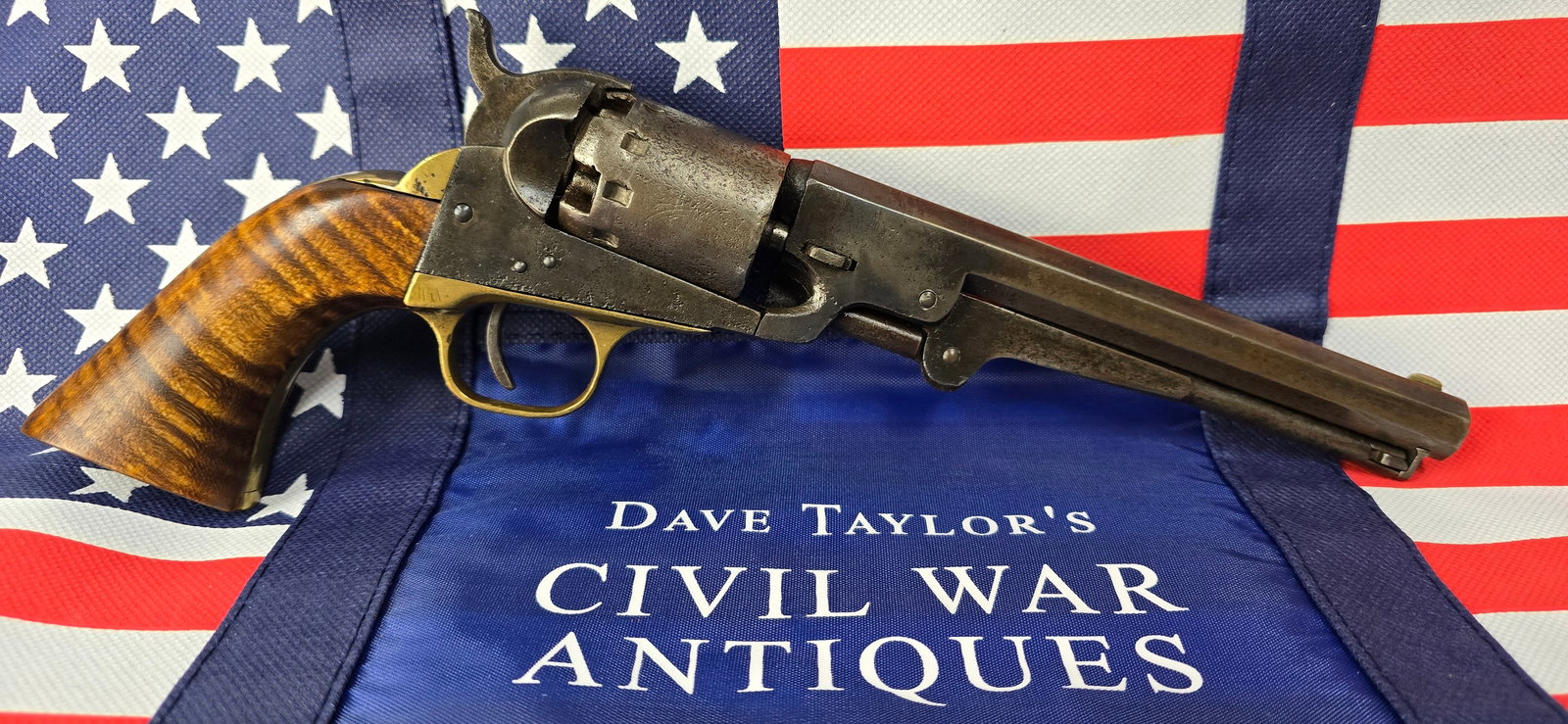 A very affordable Manhattan Navy revolver: Late 1860s Manhattan Firearms Navy revolver solid and functional and very affordable as the grips are modern replacements. They look great and fit great. Perfect for reenacting, or wall hanging, or Co