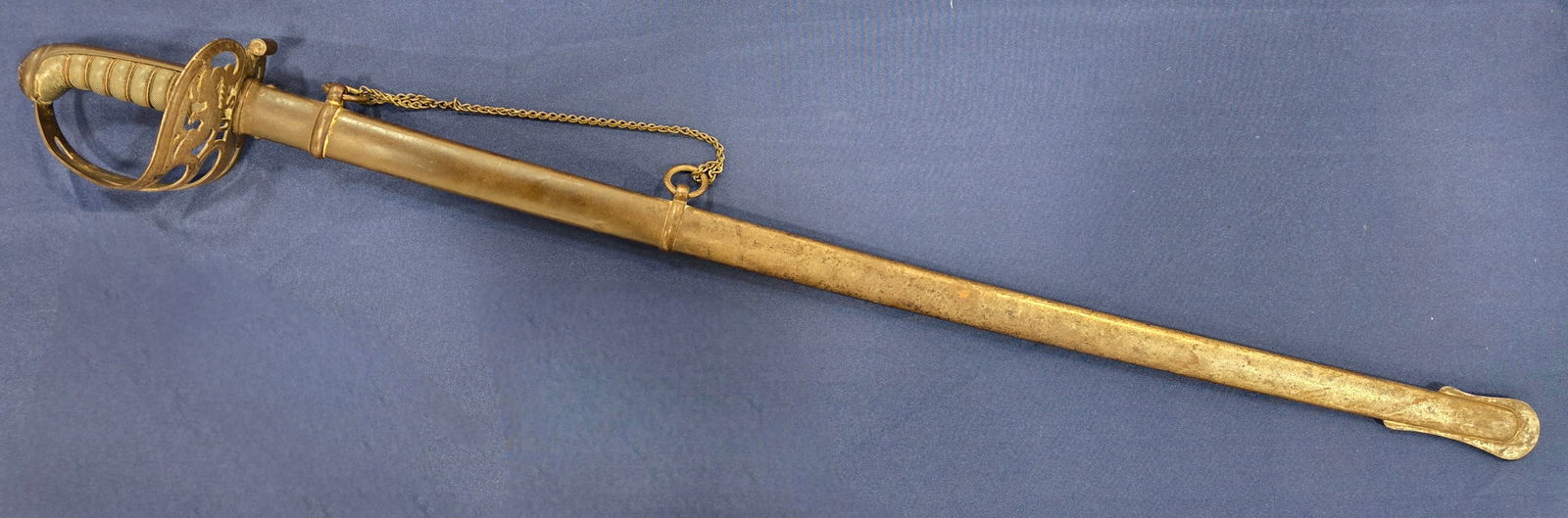 Civil War officers sword Peterson figure 75 Clauberg: A good solid example of the civil war non-regulation officers sword having an Iron Guard with spread Wing eagle and wording e pluribus unum. 100% original 100% complete with a very nice sharkskin wrap