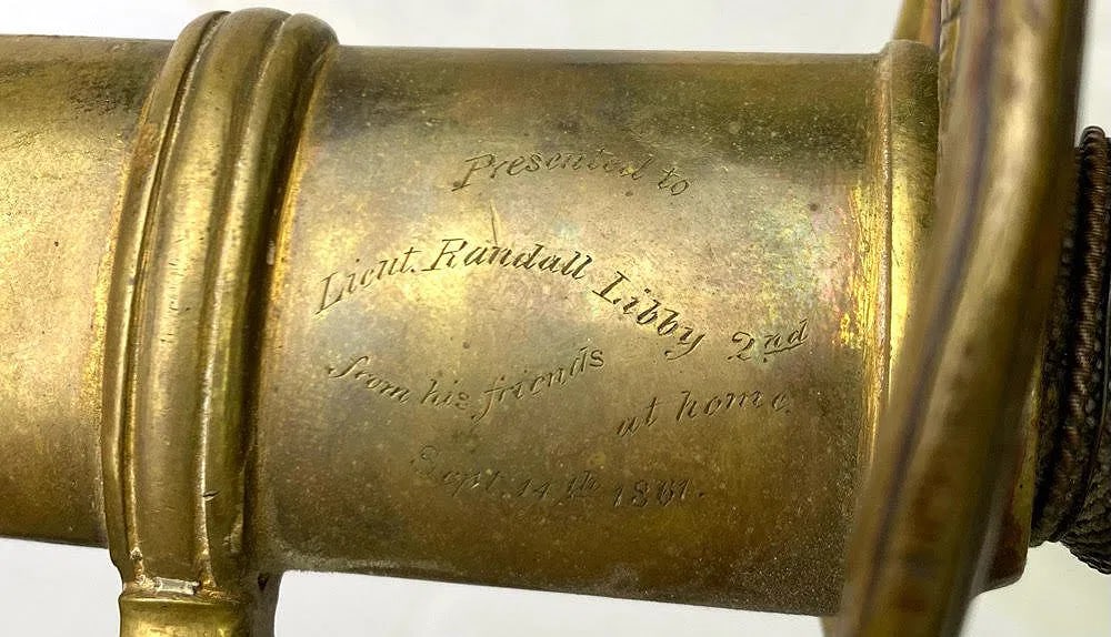 11th MAINE PRESENTATION FOOT OFFICER SWORD: This regulation Model 1850 foot officer sword by Horstmann is engraved on the upper mount: Presented to Lieut. Randall Libby 2nd By His Friends at Home DATE. Libby was from Porter, Maine, and was