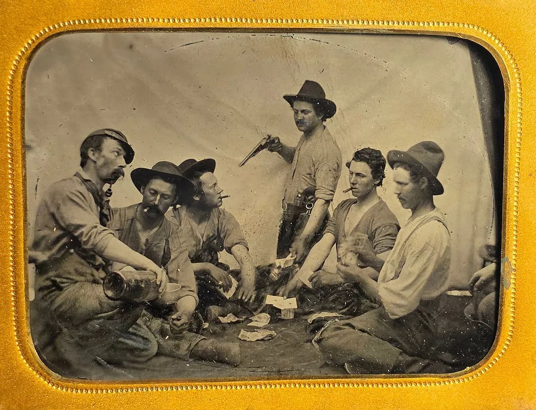 Quarter plate Tintype Soldiers Drinking and Gambling: Truly spectacular and wonderful Civil War tintype showing a group of Yankee cavalrymen drinking, smoking, playing cards, clowning with guns . Very clear and well contrasted . Look closely at the detai