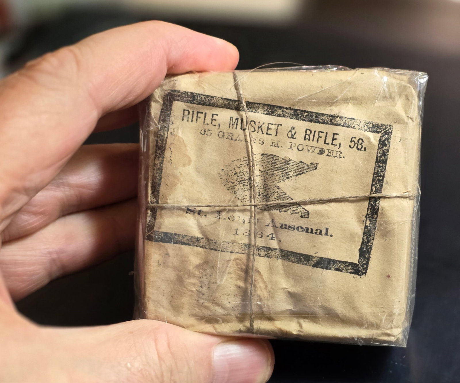 Complete full unopened package of 1864 St Louis Arsenal 58 caliber musket cartridges: The only reason we have these St Louis packages available to us is because my old friend, fellow dealer, and renowned advanced collector, Hayes Otoupalik in Montana found three unopened wooden crates 