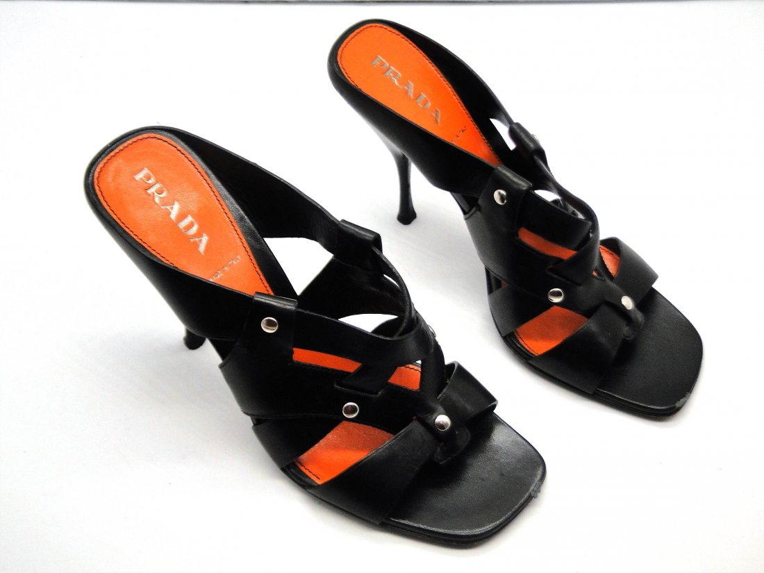Prada Shoes Women's Italian Sz 8 MSRP $650.00: Prada Women's Shoes-Made in Italy-Size 8 (European size 40) (see chart)-Color: Black leather slip on heels-Heel Size Approx: 4 inches-Condition Good-Compare at $650.00