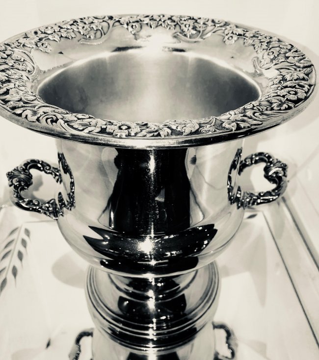 Silver plate Champagne Cooler /Ice Bucket: Silver plate Champagne Cooler /Ice Bucket-10" high-9" diameter top-6" diameter base-Rogers silverplate-very good condition-Your finest wine or champagne is deserving of the elegant Wine Cooler from Ro