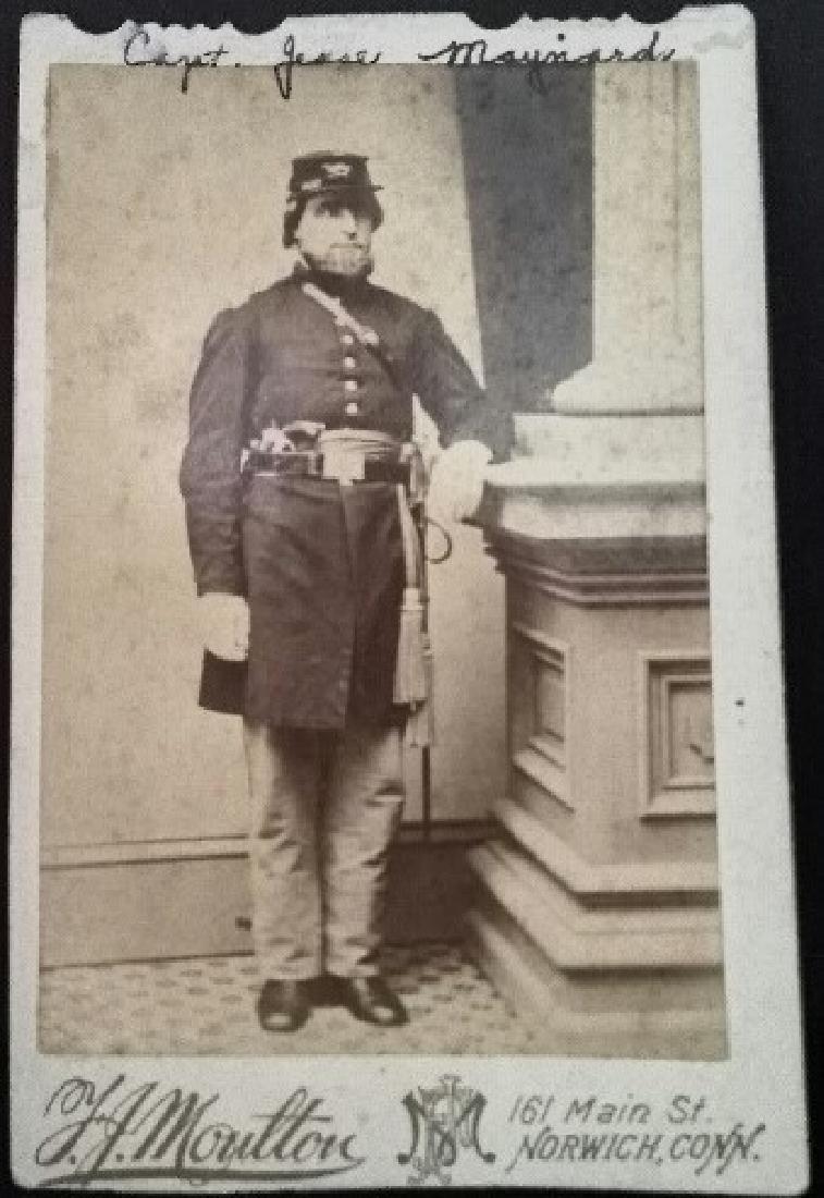 Civil War Soldier Cabinet Card. Union Army: Civil War era Cabinet Card of Union Soldier in uniform. Hand written in Iron Pen is the name Capt Jesse Maynard. Photographer is Molton of Norwich CT. Maynard enlited 9/13/1862. Discharged 8/17/1863. 