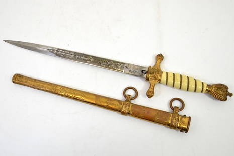 World War Two German Navy (Kriegsmarine) Officer's: World War Two German Navy (Kriegsmarine) Officer's dress dagger, housed in hammered scabbard with two hanging strap rings, cross guard with fouled anchor to centre and release clip to the reverse, pom