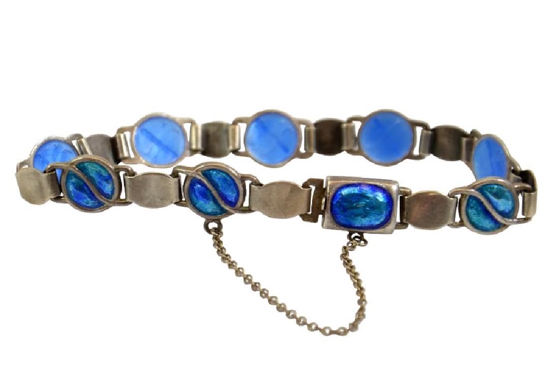 An Arts and Crafts enamelled silver bracelet, (1 of 2)