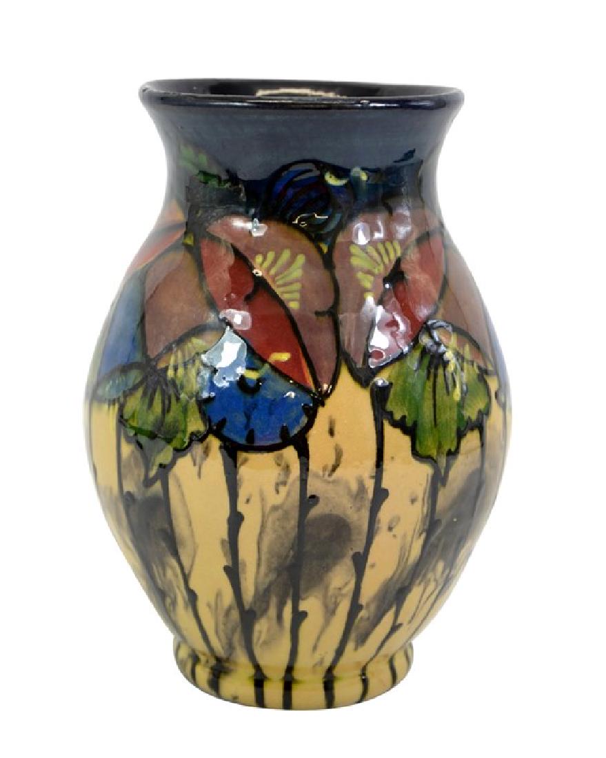 Max Lauger (attributed), a Jugendstil slip decorated: Max Lauger (attributed), a Jugendstil slip decorated vase, probably Karlsruhe or Kandern, circa 1910, ovoid form, painted with stylised bell flowers, impressed mark Germany and incised numbers, 20cm h