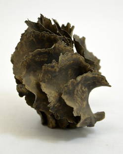 Ursula Morley Price, a studio pottery sculpture,: Ursula Morley Price, a studio pottery sculpture, interlocking crimped leaf forms, black ash glazed stoneware, seal mark, 10.5cm high