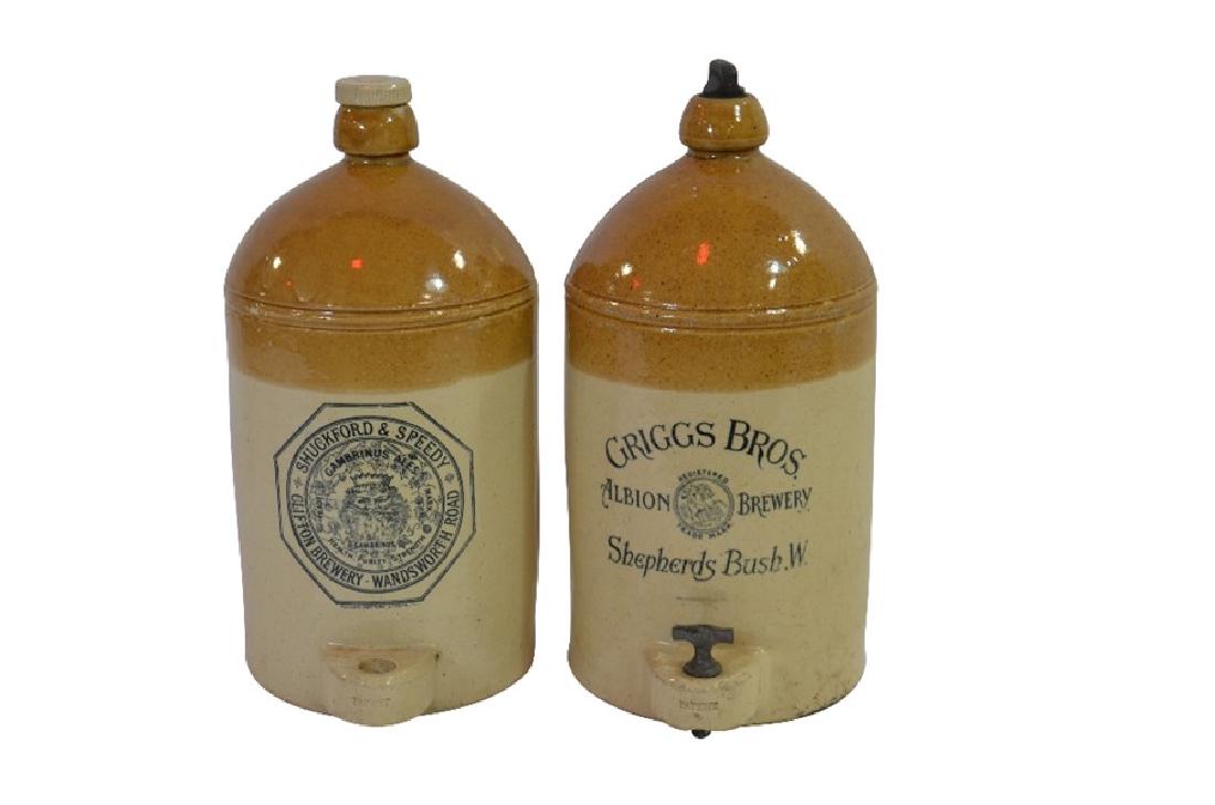 Two patent dispensing flagons including Grigg's Bros,: Two patent dispensing flagons including Grigg's Bros, Shepherds Bush and Shuckford & Speedy, Clifton Brewery, Wandsworth Road. (2)