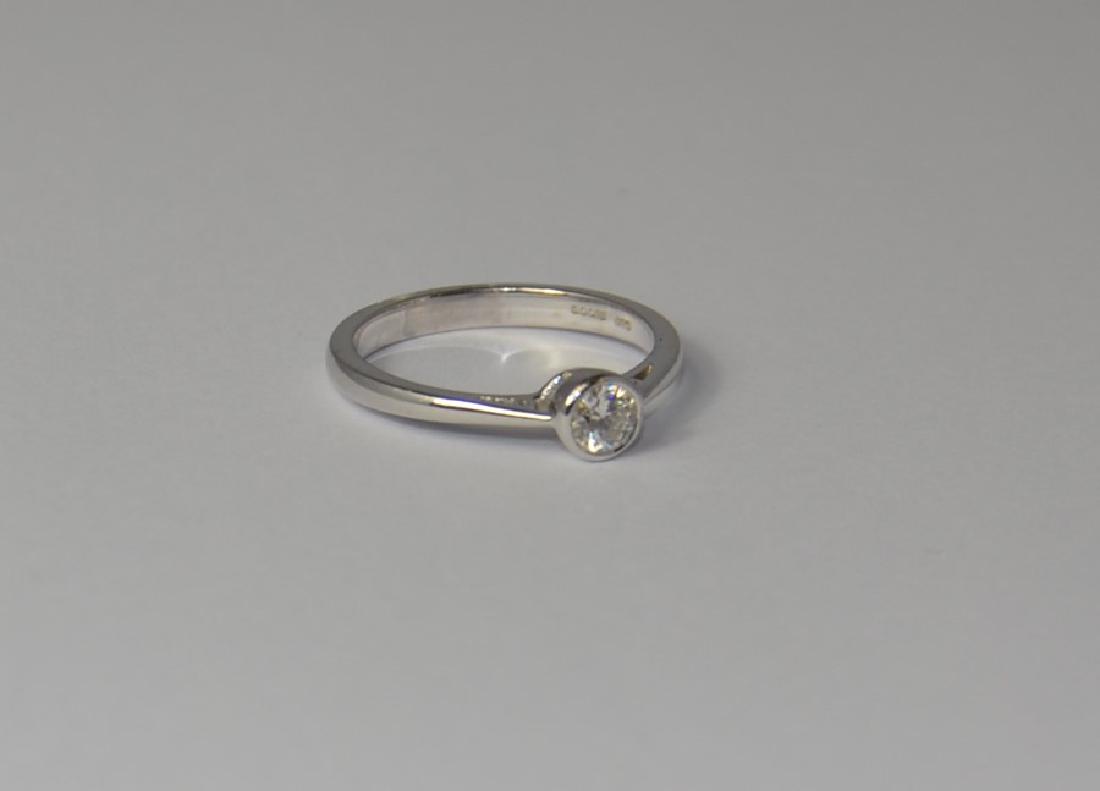 A platinum single stone ring. Brilliant cut diamond in (1 of 1)