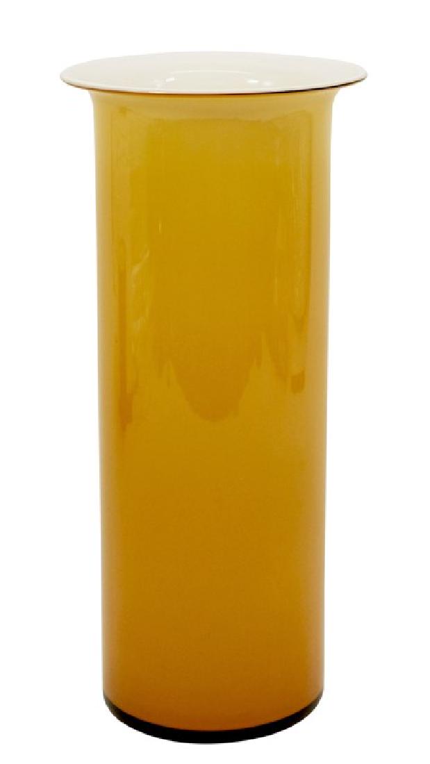 Michael Bang for Holmegaard, a Rainbow cased glass: Michael Bang for Holmegaard, a Rainbow cased glass cylinder vase, circa 1970, amber over opaque white, with everted rim, 26.5cm high