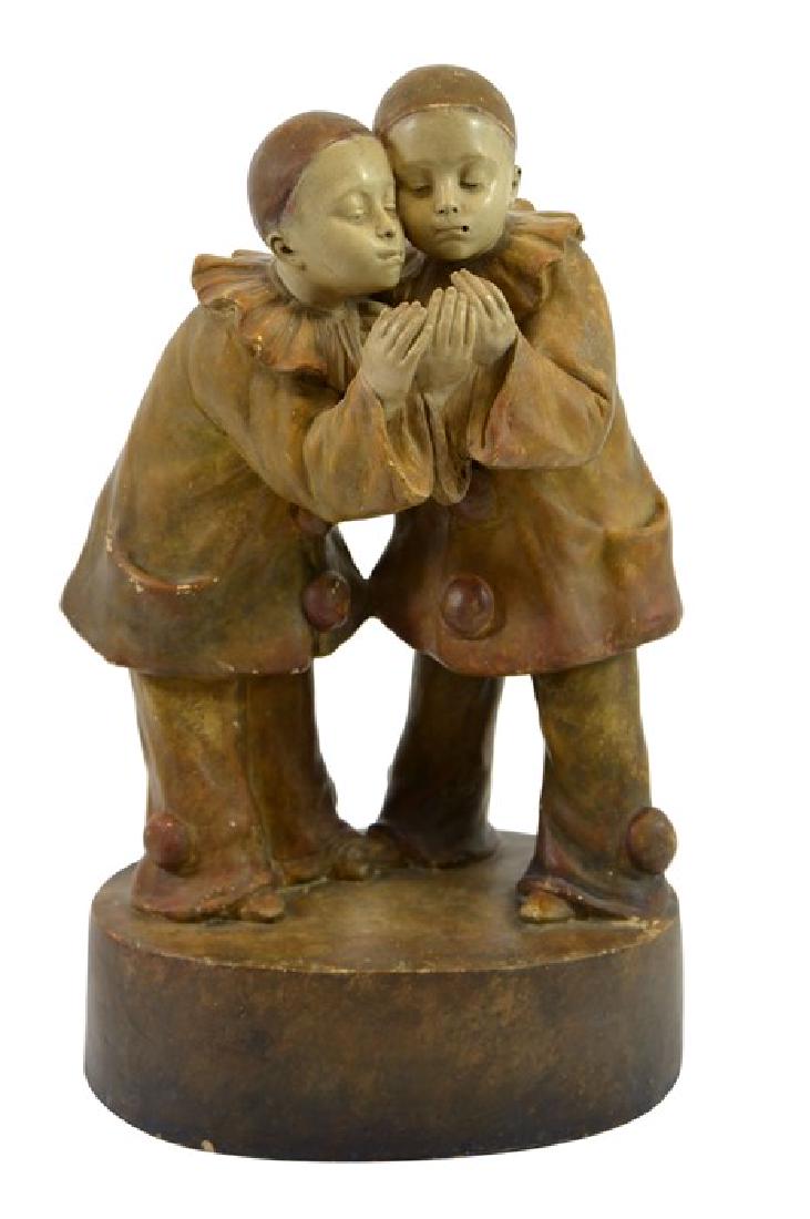 Adolphe Jean Lavergne for Goldscheider, lamp base: Adolphe Jean Lavergne for Goldscheider, lamp base figure group of two boy pierrots, circa 1912, model 3721, standing smoking in clown costumes, incised signature to plinth, stamped marks and number 28