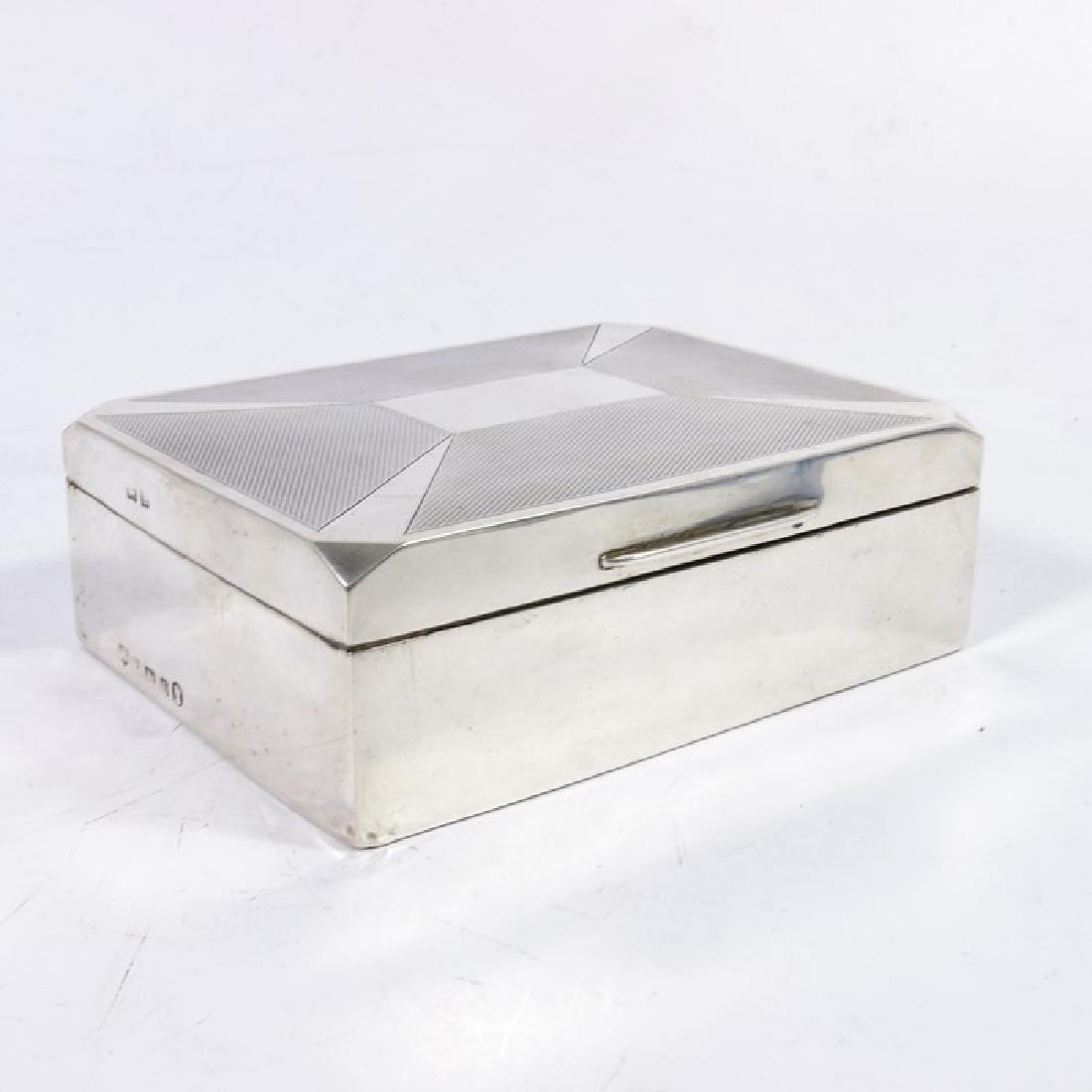 An Art Deco silver cigar casket, Birmingham 1935, (1 of 5)