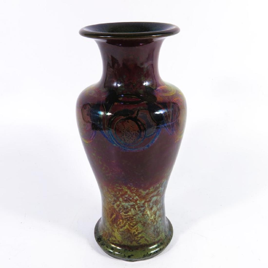 Gladys Rodgers for Pilkington, a Royal Lancastrian: Gladys Rodgers for Pilkington, a Royal Lancastrian lustre vase, circa 1925, inverse baluster form with everted rim, decorated with a band of fruiting vines, impressed marks and monogram, 21.5cm high