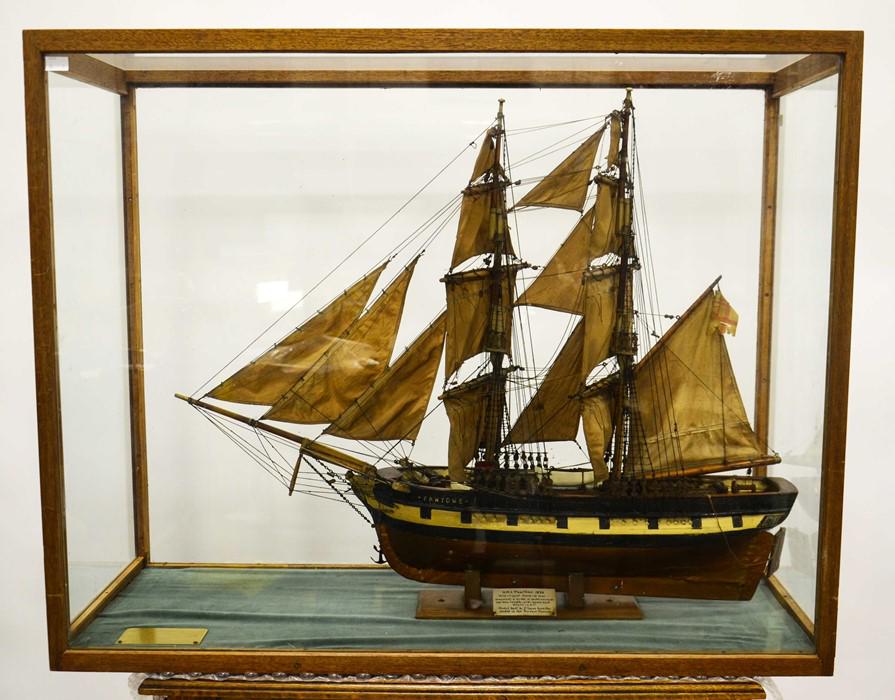 A ship model of HMS Fantome (1839), brig sloop of: A ship model of HMS Fantome (1839), brig sloop of warship,with canvas sails and timber rigging, model built by J Seyer from the model built in the Science Museum, housed in wooden and glass display ca