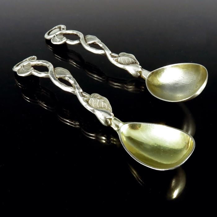 Two early Victorian cast silver condiment spoons, (1 of 4)