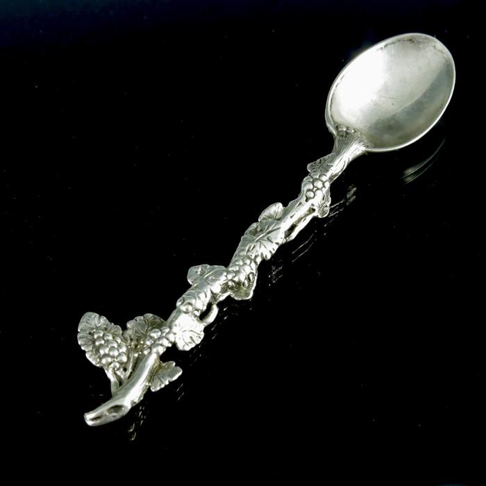 A George II cast silver teaspoon, circa 1750, modelled (1 of 7)