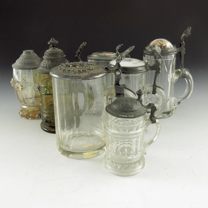 Seven various glass steins, third and half litre, (1 of 3)