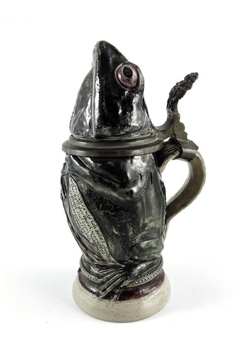 A German salt glazed stoneware novelty character stein, (1 of 8)
