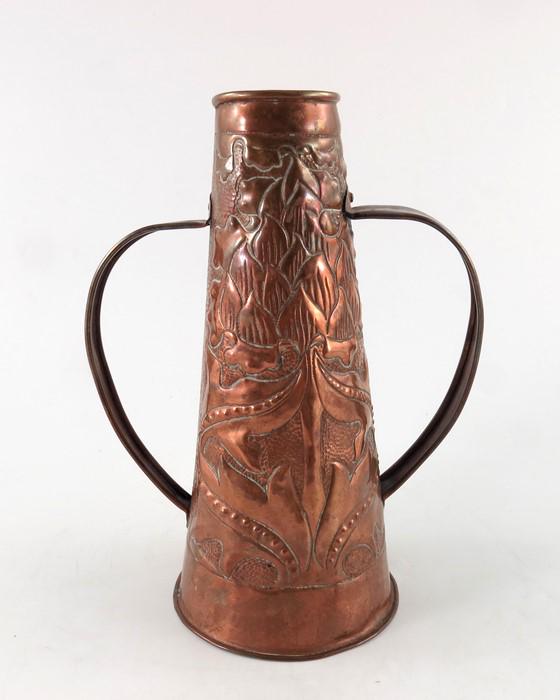John Williams (attributed), an Arts and Crafts copper: John Williams (attributed), an Arts and Crafts copper twin handled vase, conical form, repousse decorated with stylised artichoke design, 26cm high