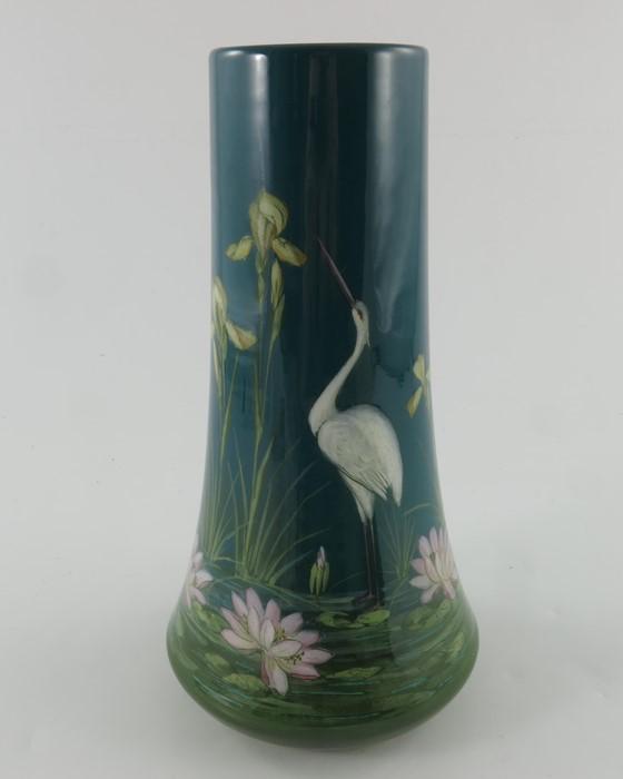 Jerome Massier, a vase decorated with a stork by the: Jerome Massier, a vase decorated with a stork by the side of a pool with irises and waterlilies, circa 1900, printed marks, 25.5cm high