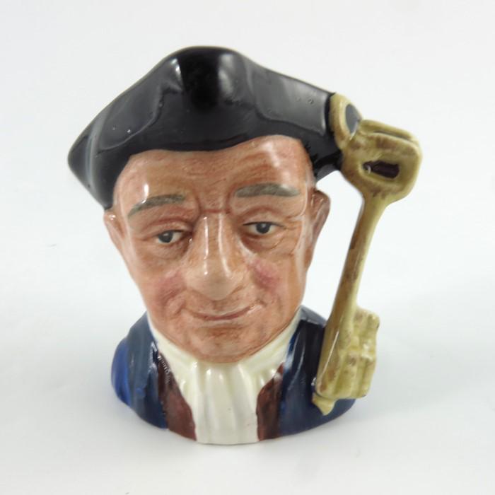 A Royal Doulton miniature character jug, Gaoler, in a (1 of 5)