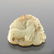 A Chinese carved jade pendant, in the form of a goat