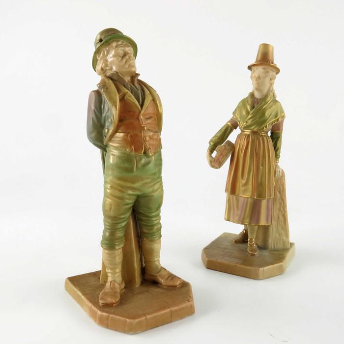 James Hadley for Royal Worcester, two figures, Irishman: James Hadley for Royal Worcester, two figures, Irishman and Welsh Woman, models 1875 and 835, in shot enamels colourway, 18cm high
