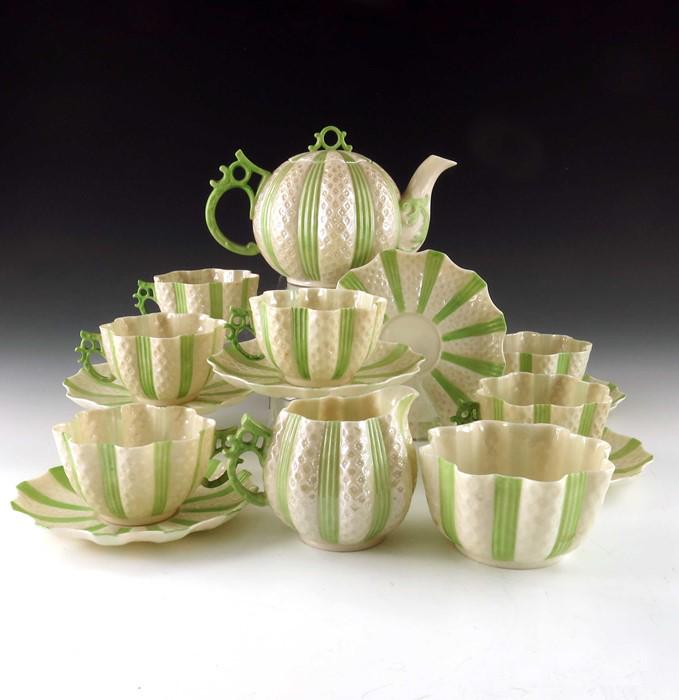 A Belleek Five O'Clock Tea Set, second period,: A Belleek Five O'Clock Tea Set, second period, including teapot, jug, bowl, six cups and six saucers, teapot 19cm long (15)