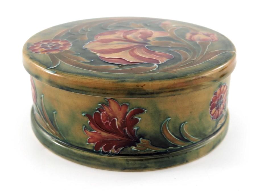 William Moorcroft for James MacIntyre, a Spanish pot: William Moorcroft for James MacIntyre, a Spanish pot and cover, circa 1910, cylindrical squat drum form, underglaze green signature, 16cm diameter