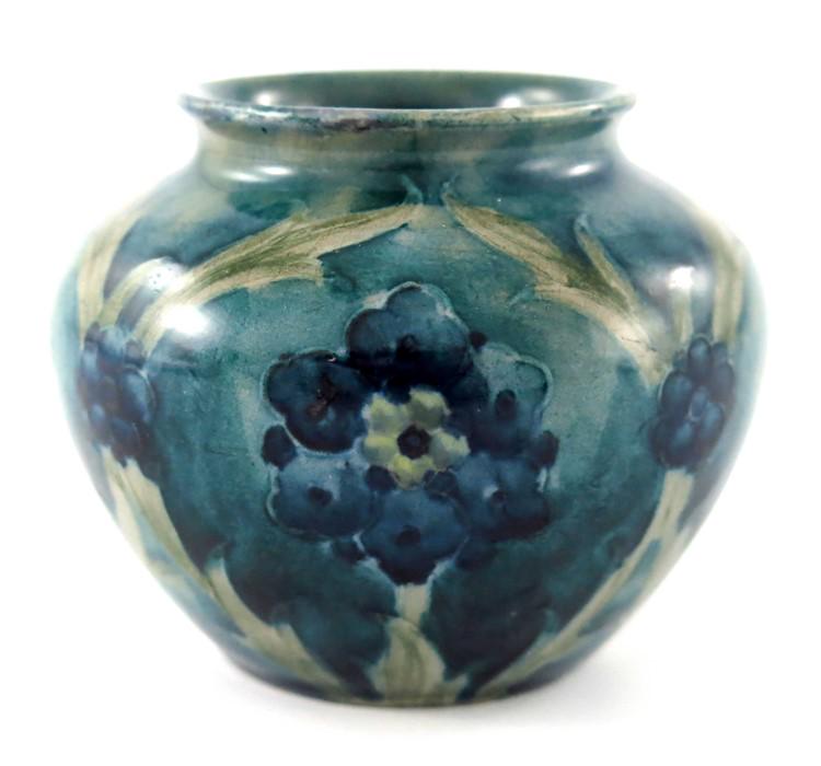 William Moorcroft, a small Late Florian vase, circa: William Moorcroft, a small Late Florian vase, circa 1915, shouldered ovoid form, impressed Burslem marks and underglaze green monogram, 6.5cm high