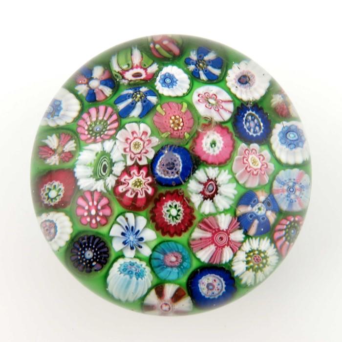 Clichy, spaced millefiori paperweight, containing (1 of 4)