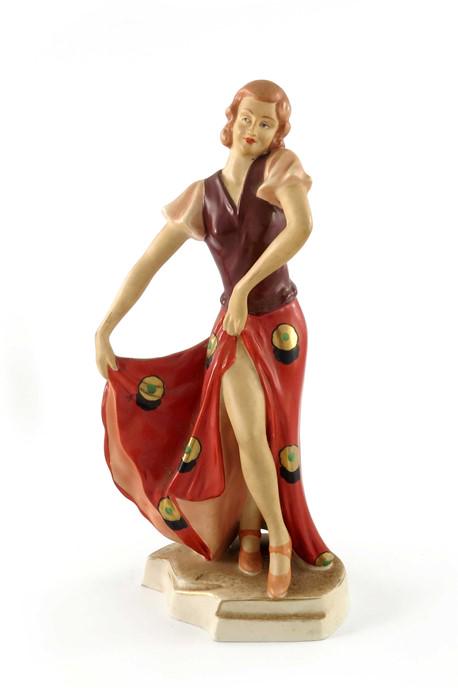 Royal Dux, an Art Deco figure, modelled as a woman in (1 of 7)