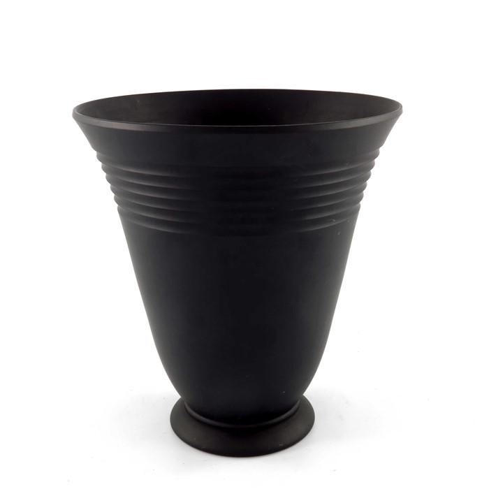 Keith Murray for Wedgwood, a black basalt vase, circa: Keith Murray for Wedgwood, a black basalt vase, circa 1933, footed trumpet form with fluted bands to the upper body, impressed marks and printed facsimile, 20.5cm high