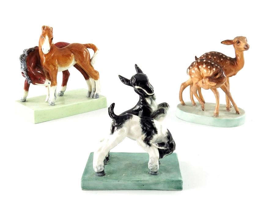 Doris Lindner for Royal Worcester, three figure groups,: Doris Lindner for Royal Worcester, three figure groups, Young Spotted Deer figure 3316, Kids at Play 3153 and Foals 3152, 14.5cm high (3)