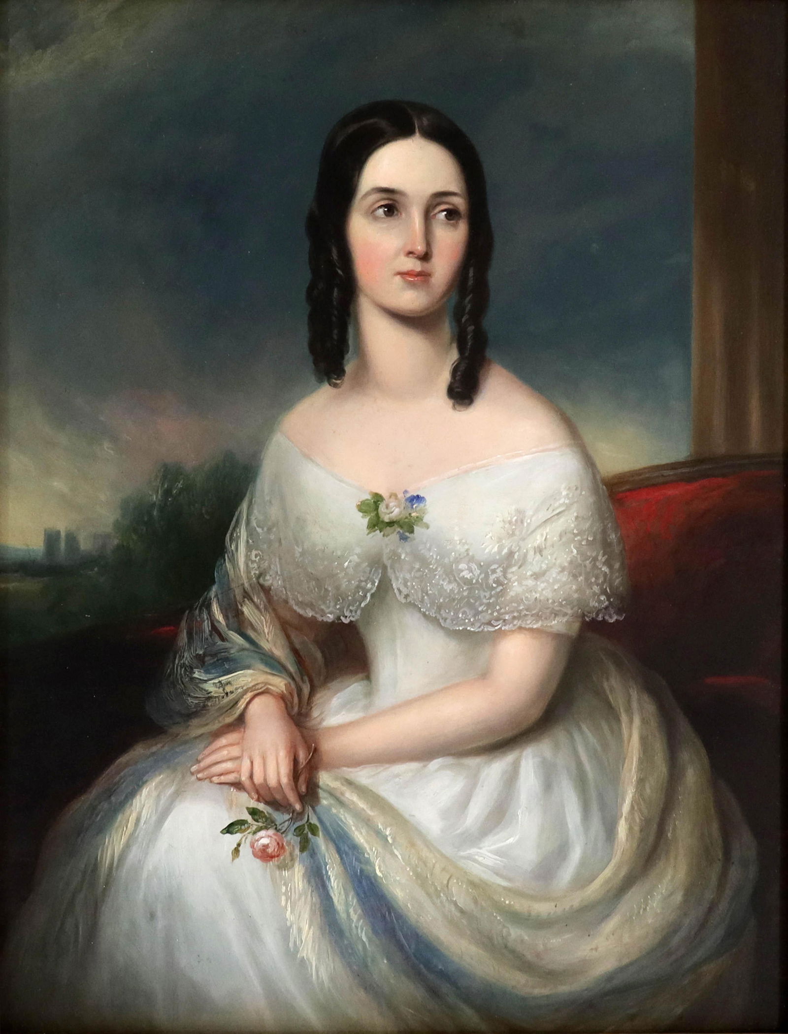 William Moore of York (British ,19th Cen: William Moore of York (British ,19th Century), portrait of Eliza Beatty, nee Moore wife of Rev Thomas Beatty, seated three quarter length, in a white dress and holding a rose, a view of York Minster i