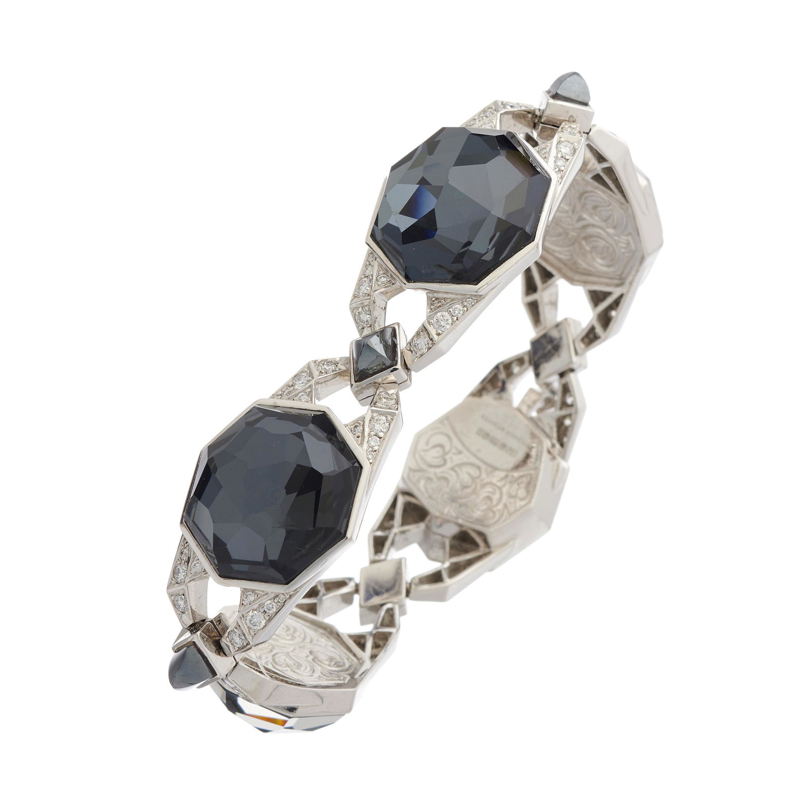 Stephen Webster, an 18ct gold hematite,: Stephen Webster, an 18ct gold hematite, rock crystal and diamond 'Crystal Haze' bracelet, estimated total diamond weight 1.50ct, maker's marks for Stephen Webster, hallmarks for London 2007, length 16