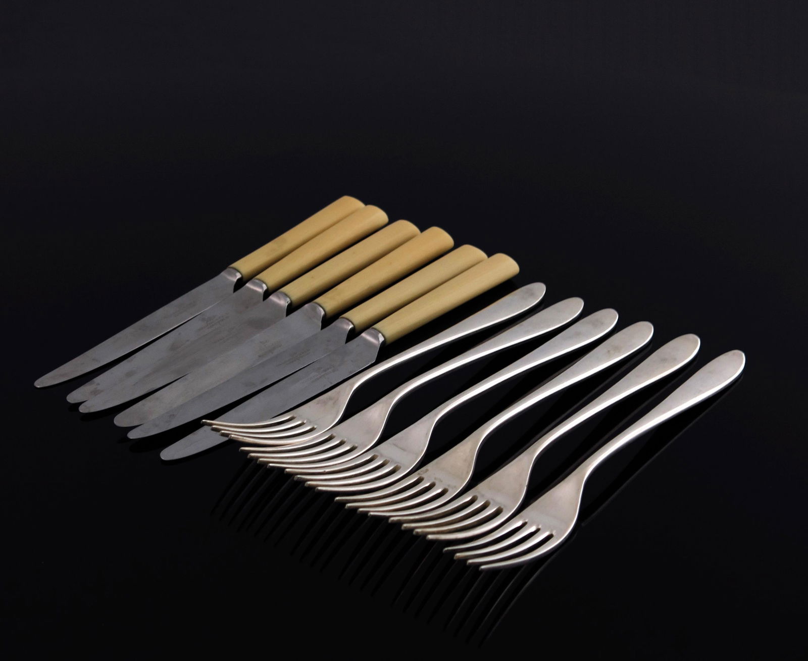 David Mellor for Walker and Hall, a set: David Mellor for Walker and Hall, a set of Pride pattern knives and silver plated forks, designed 1953, including six forks and six ivorine handled knives, marked to each Walker and Hall Sheffield, 18