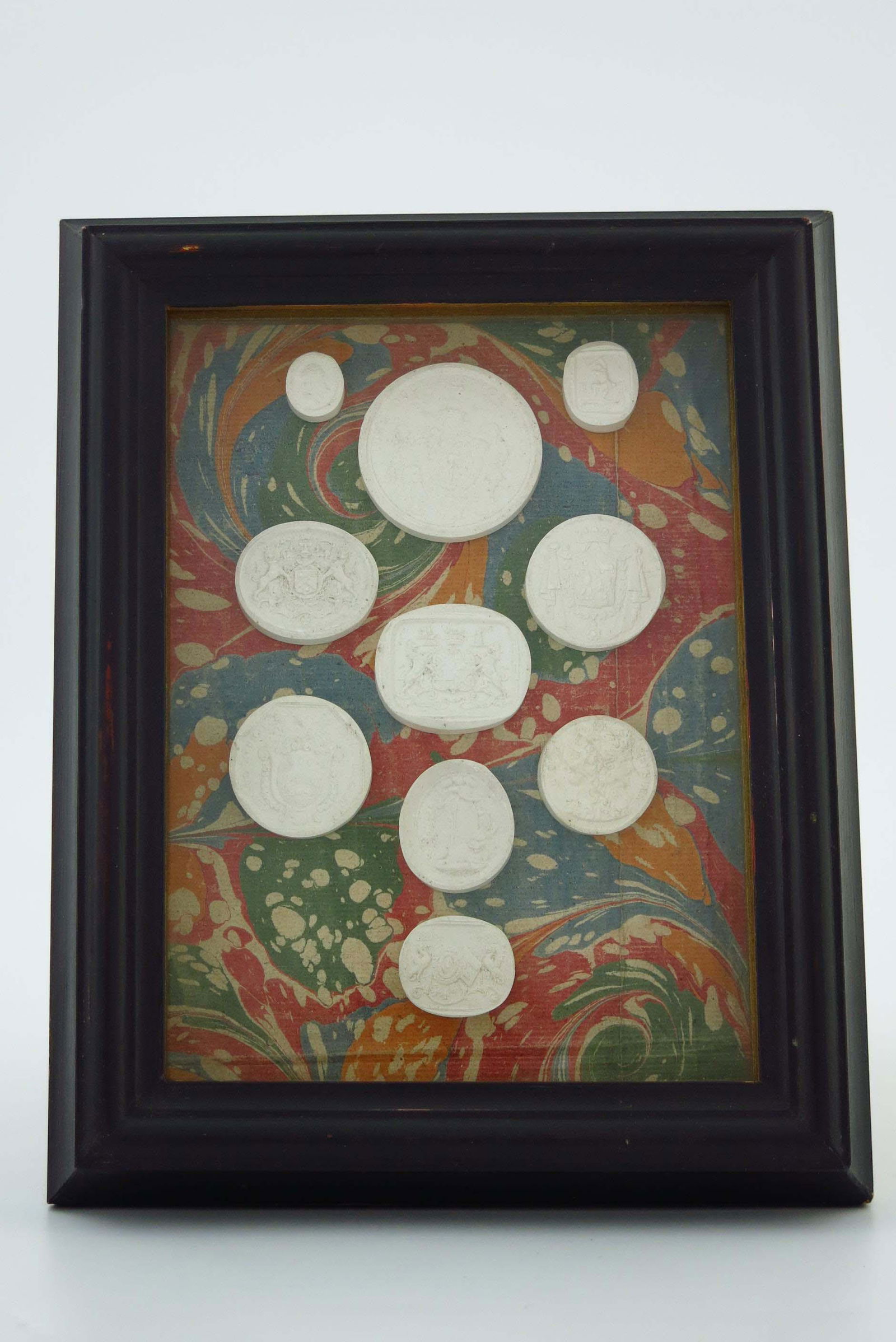 A framed decorative display of ten 'Gran (1 of 3)