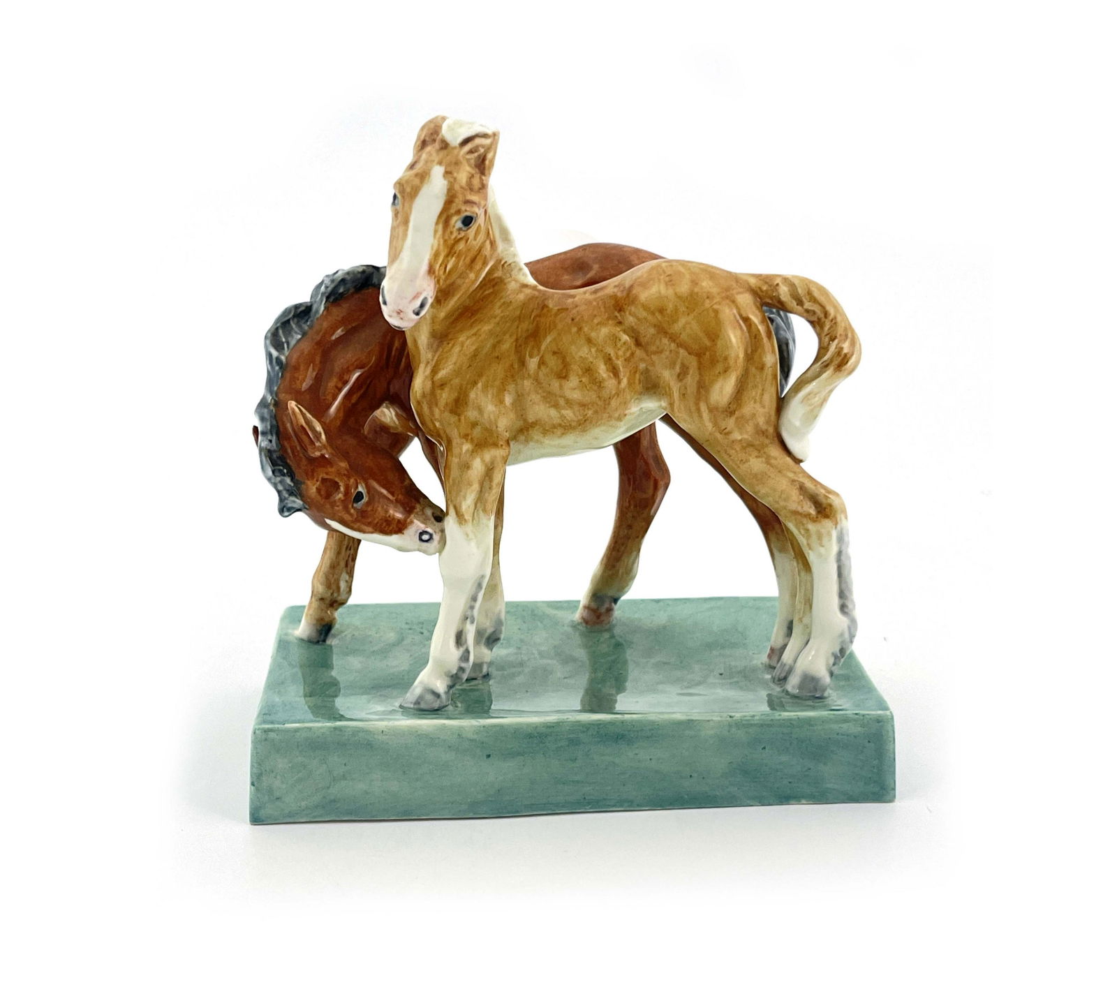 Doris Lindner for Royal Worcester, Foals: Doris Lindner for Royal Worcester, Foals, figure group model 3152, 1952, on green slab base, 14.5cm high