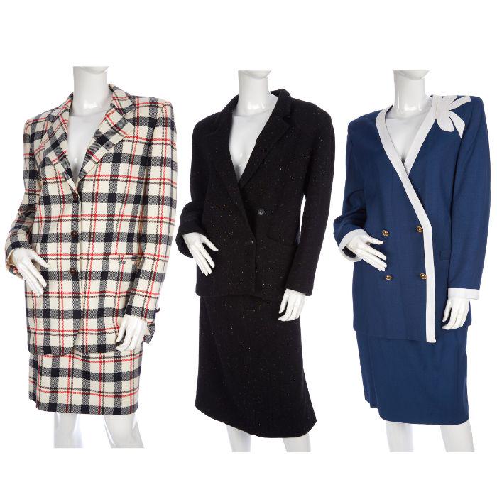 Three designer outfits, to include a bla: Three designer outfits, to include a black wool skirt suit by Cacharel, a red, white and blue tartan skirt suit by Escada Sport and a blue skirt suit with white trim by Nina Ricci, all with maker's la