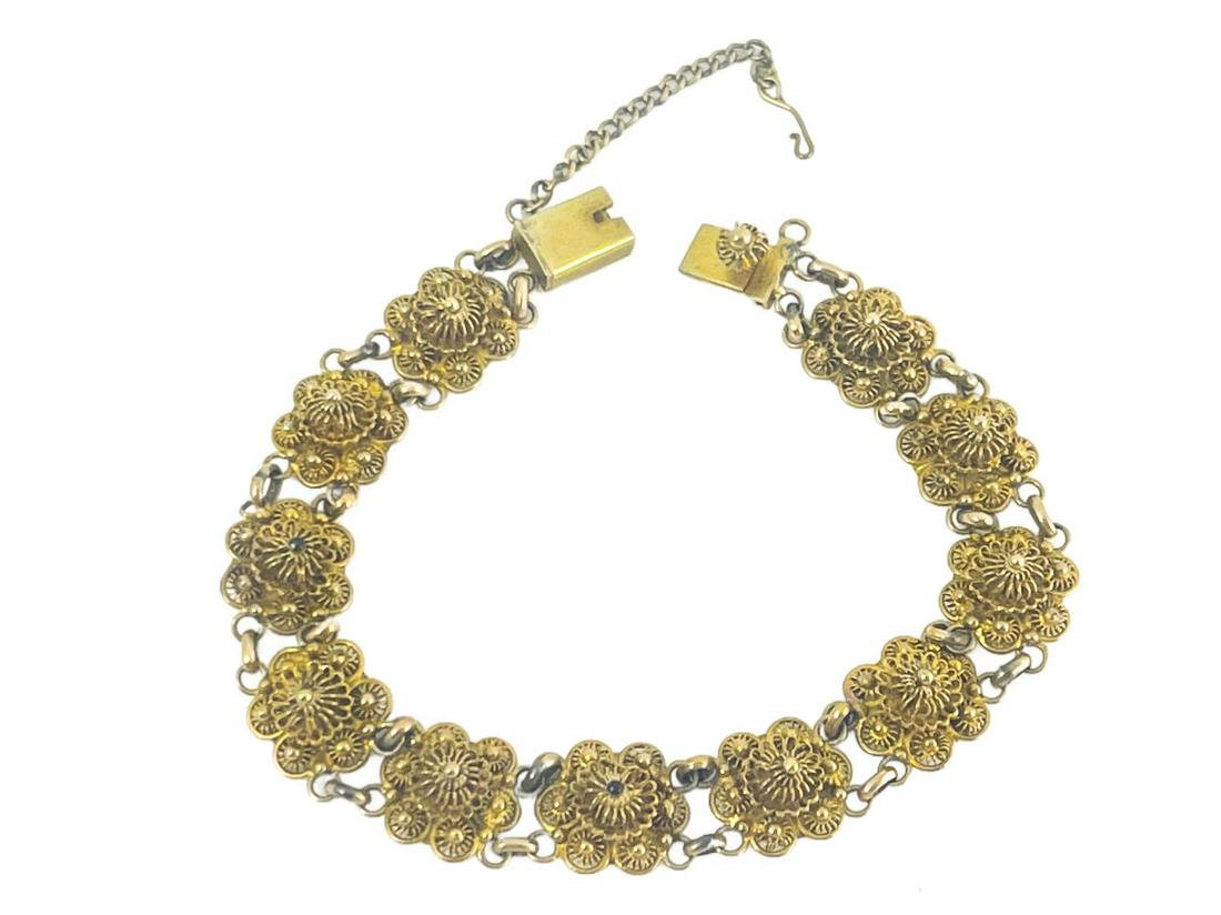 A 14 carat gold filigree bracelet, each (1 of 3)