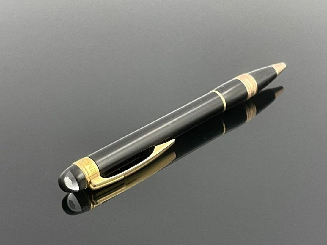 Montblanc, a Starwalker ballpoint pen, r: Montblanc, a Starwalker ballpoint pen, rose gold fittings, hologram dome terminal, with serial number to the clip, 14cm long