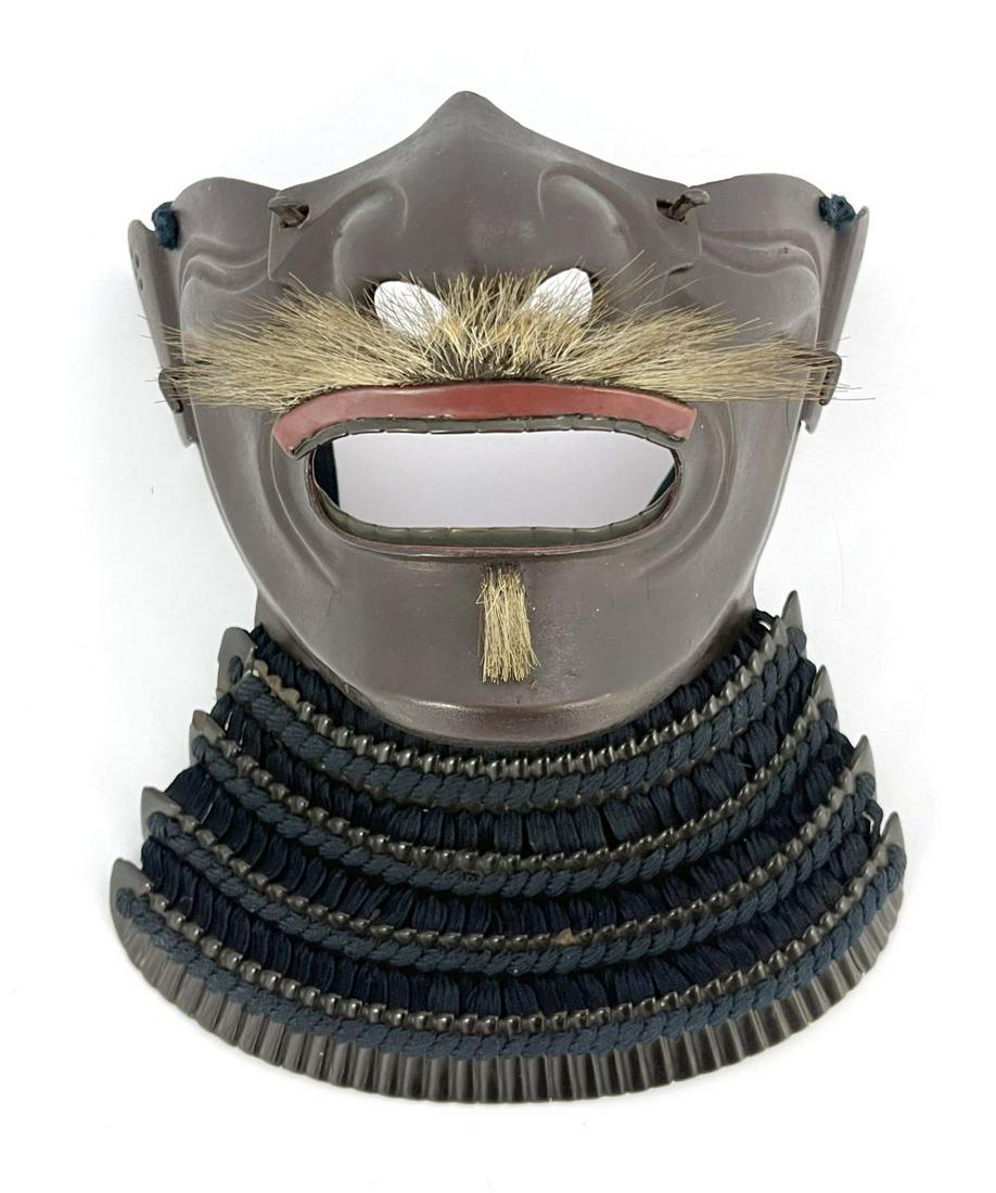Japanese Russet Iron Ressi Men (half-mas: Japanese Russet Iron Ressi Men (half-mask) and Yodare-Kake, (throat guard), mid to late Edo period, moustache and small goatee brush, embossed cheeks and other facial features, detachable nose guard p
