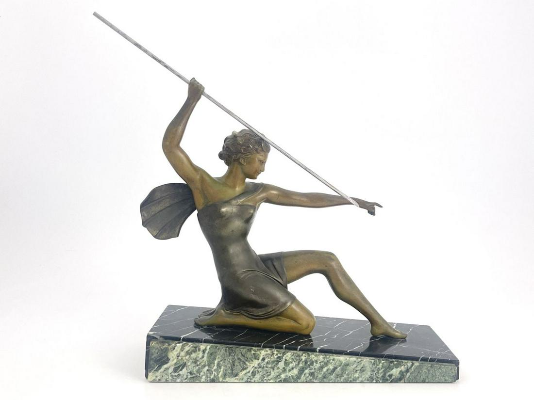 Ugo Cipriani, Diana, an Art Deco patinat: Ugo Cipriani, Diana, an Art Deco patinated art metal figure, circa 1925, modelled as a woman throwing a spear, on marble wedge base, incised mark Uriano, 38.5cm high